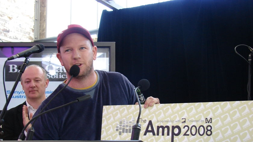 Brad Barry of the band Eddy Current Suppression Ring accepts the 2008 Australia Music Prize in Sydney.