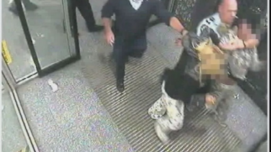 Security footage shown to IBAC shows Ballarat Sergeant Christopher Taylor subduing two women during an earlier case.