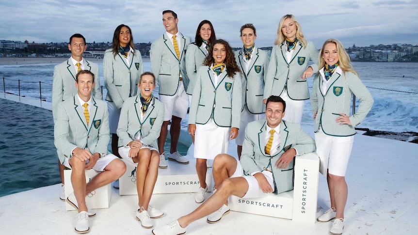 A group of Olympic athletes model the Australian team's uniform