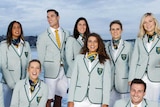 A group of Olympic athletes model the Australian team's uniform