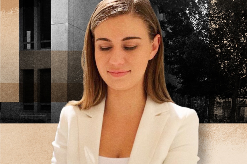 A young woman with long brown hair sits in a courtyard looking down wearing a white blazer and white top