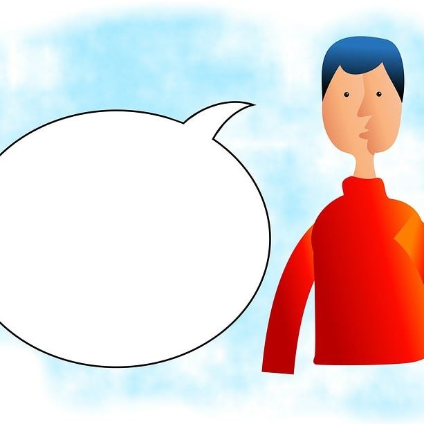 Drawing of a male speaker with a blank speech bubble