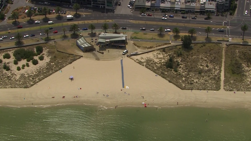 An aerial shot of a beach in inner Melbourne.