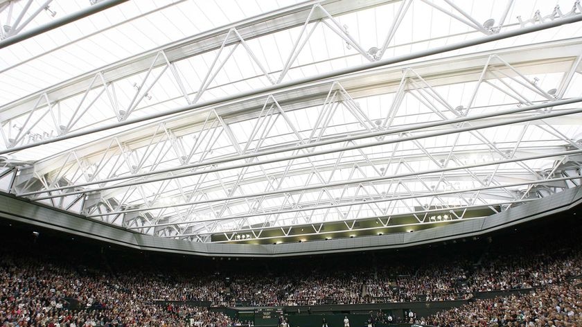 Henman/Clijsters playing Agassi/ Graf during the launch of the new retractable roof