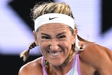 Victoria Azarenka hits a backhand return at the Australian Open.