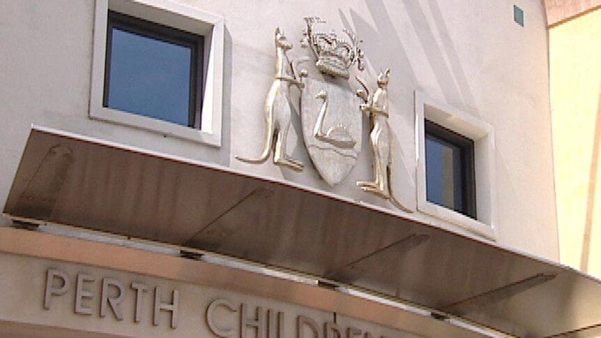 Close up of sign and emblem of Perth Children's court