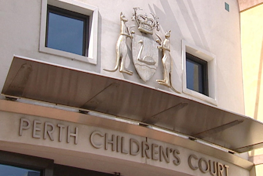 Close up of sign and emblem of Perth Children's court
