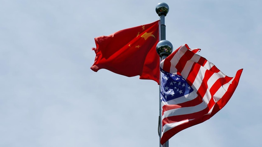 Chinese and U.S. flags flutter