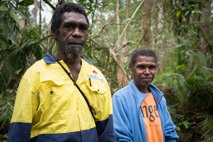 Two Traditional Owners of Kutini-Payamu (Iron Range) National Park, Roderick Doctor and Flora Giblet, in the rainforest.
