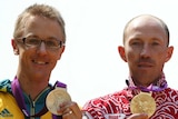 London gold ... Jared Tallent stands alongside Sergey Kirdyapkin on the medal dais at the 2012 Olympics