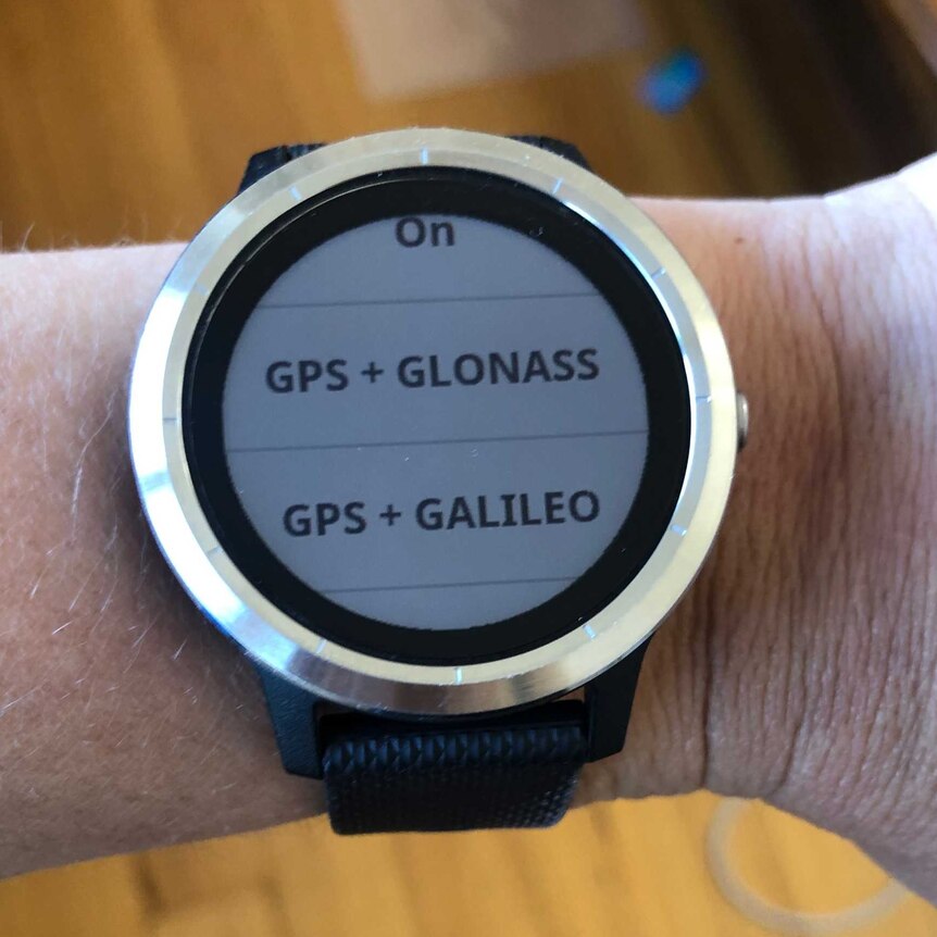 A watch with text on the screen
