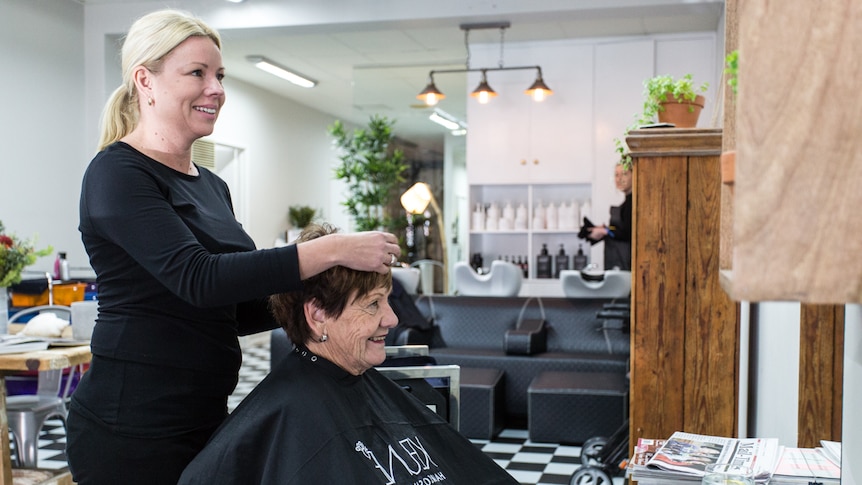 Hairdresser Michelle Shanks and a client.