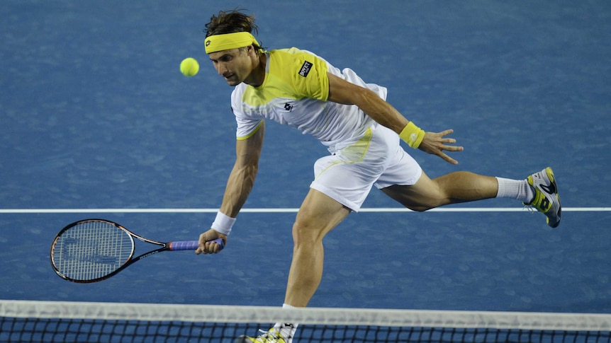 Ferrer approaches the net