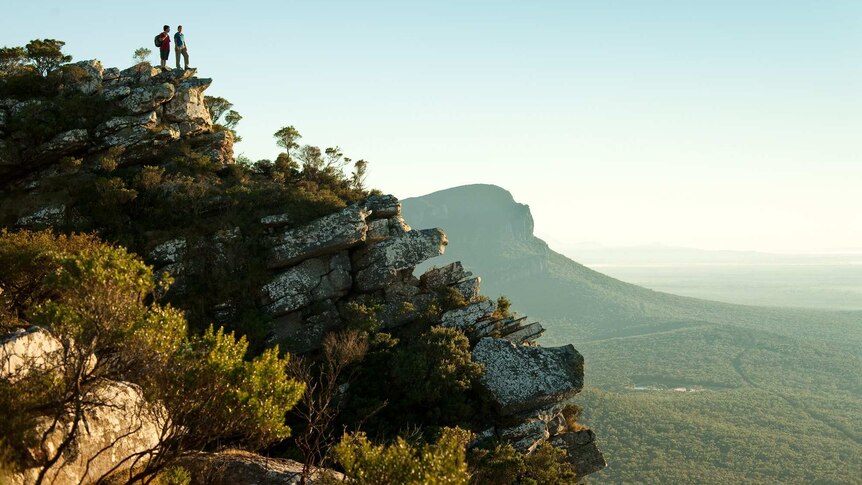 Hikers look out across the Grampians National Park in Victoria's east.