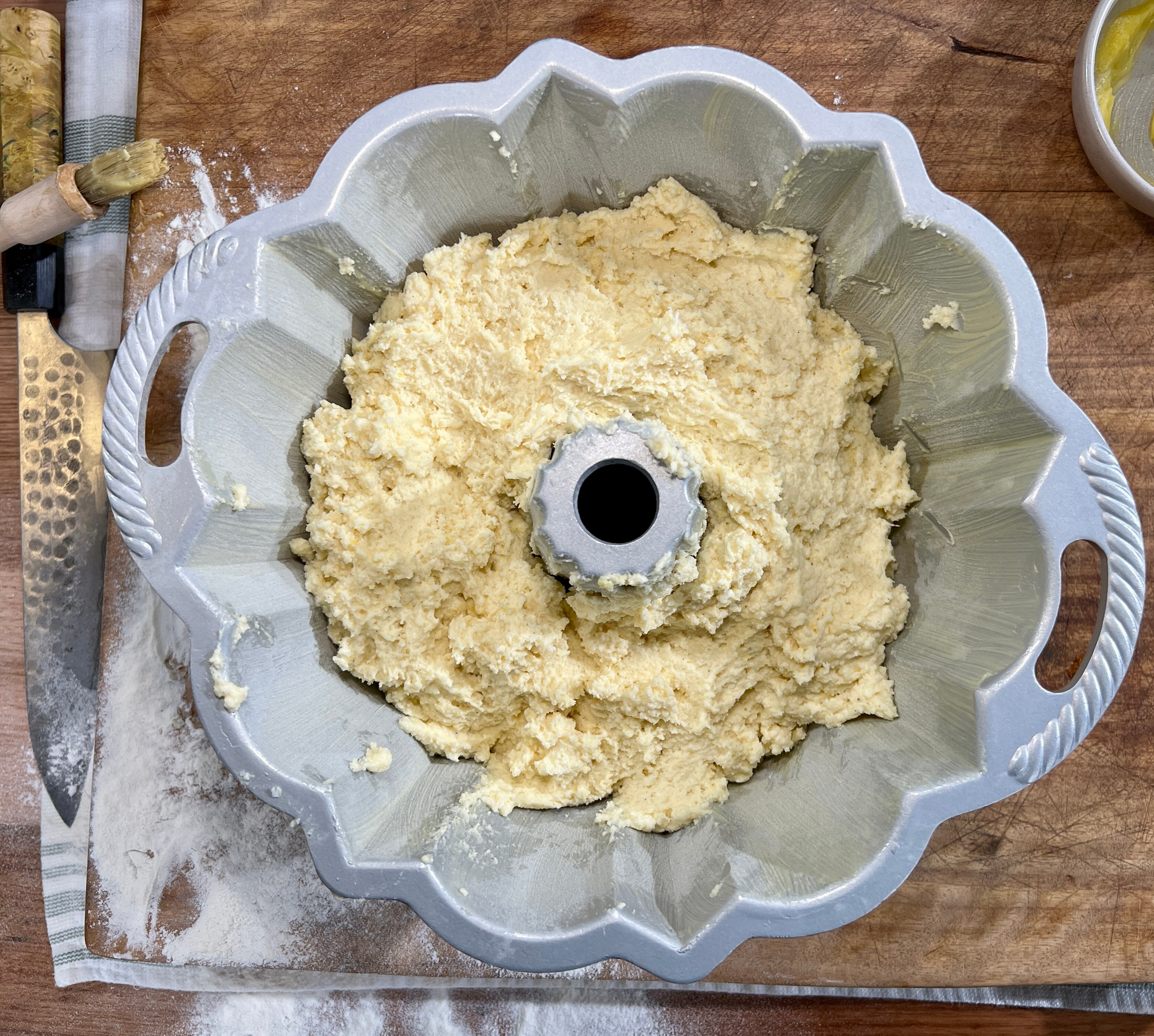 A picture of lemon ricotta cake mix in a bundt pan