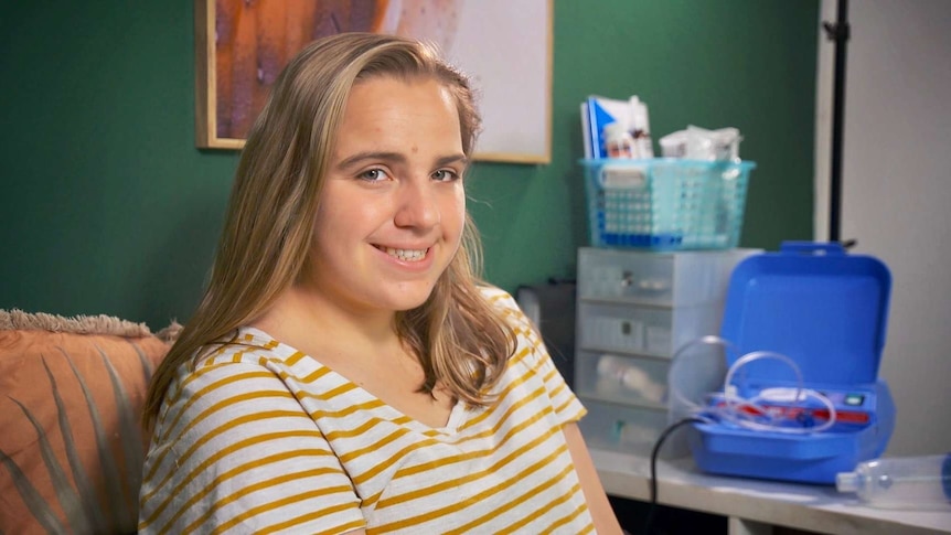 Eloise Robertson with medical equipment.