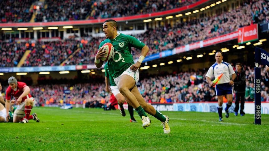 Ireland winger Simon Zebo scores a Six Nations try against Wales in February 2013.
