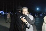 Moamar Gaddafi (in black) embraces Lockerbie bomber Abdelbaset al-Megrahi upon his controversial return to Libya in 2009.
