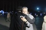 Gaddafi hugs Lockerbie bomber al-Megrahi.
