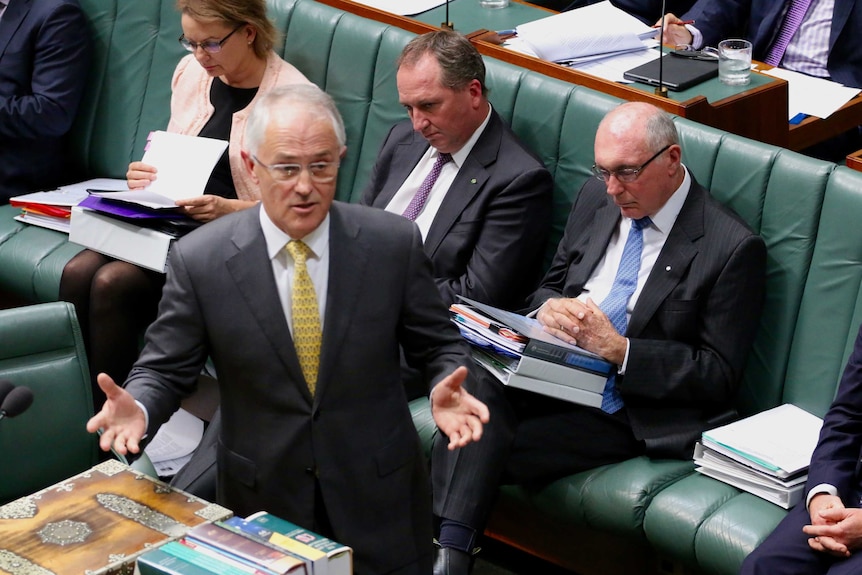 Warren Truss appears to be asleep while Malcolm Turnbull speaks in Parliament.