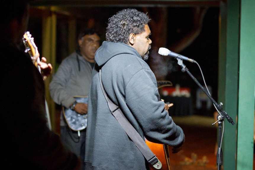 Guitarist James Minning fronts The Desert Stars during a concert in Coolgardie.