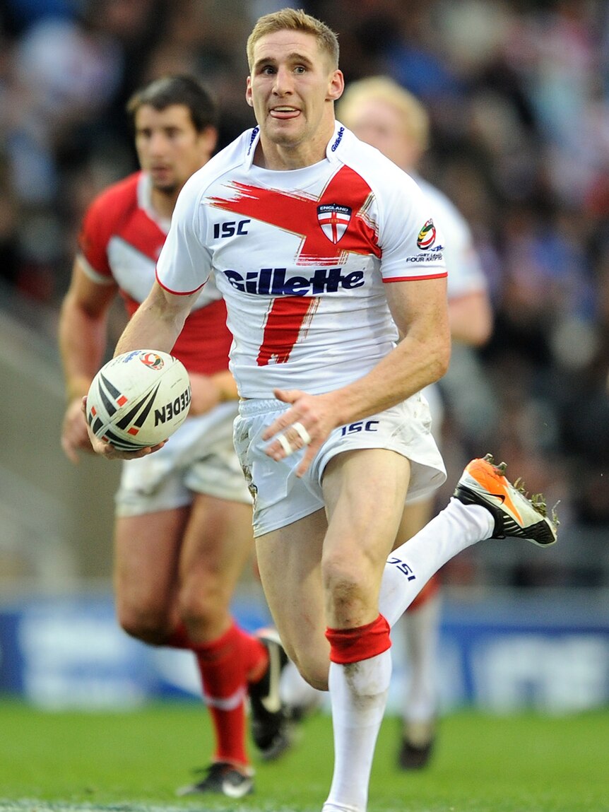 England rugby league full-back Sam Tomkins running with ball