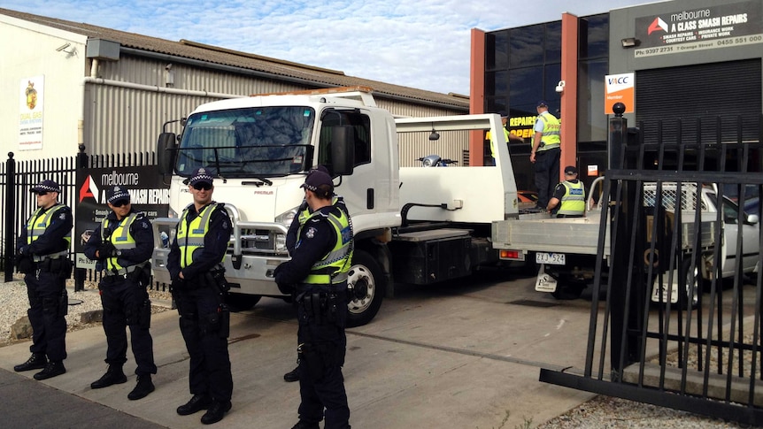 Vic Police stand outside Williamstown property that was raided