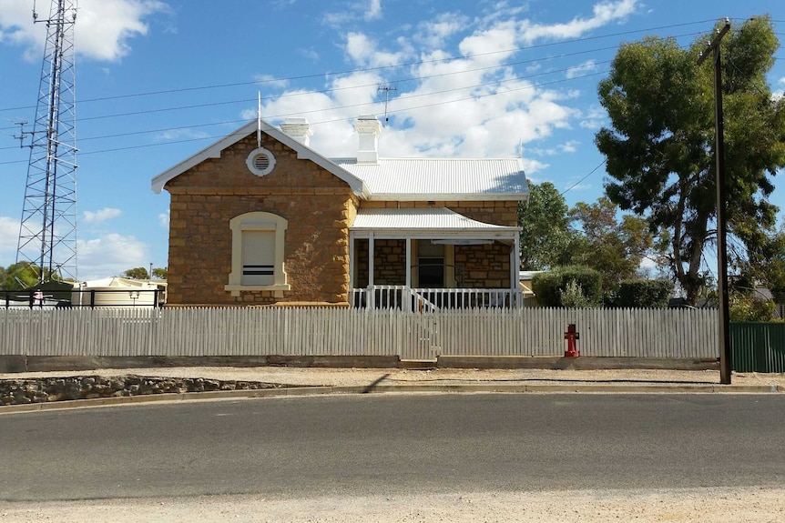 Modern image of stone house formerly occupied by Morgan postmaster.