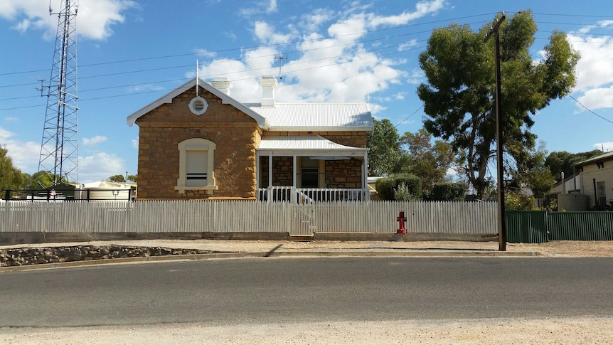 Modern image of stone house formerly occupied by Morgan postmaster.