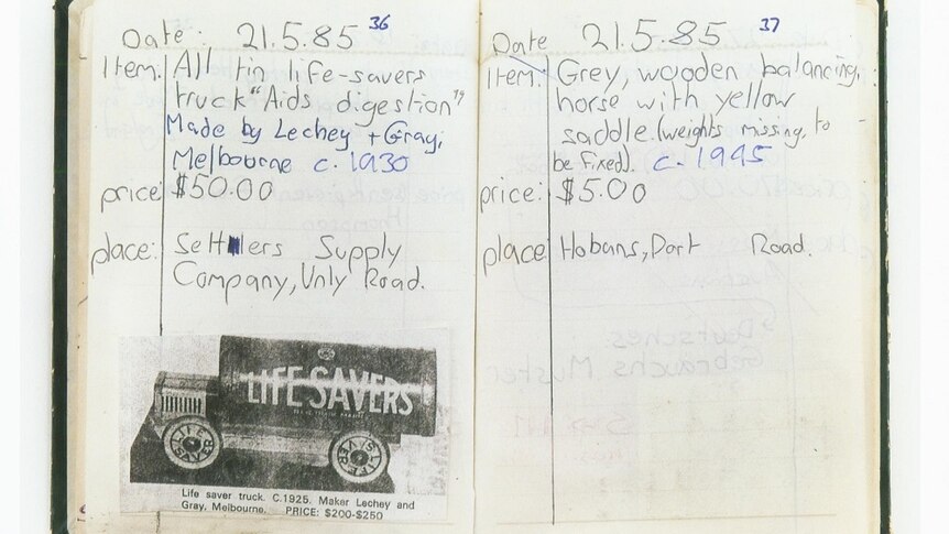 A scan of an open book shows children's handwriting listing a number of toys, their descriptions, prices and places of purchase.