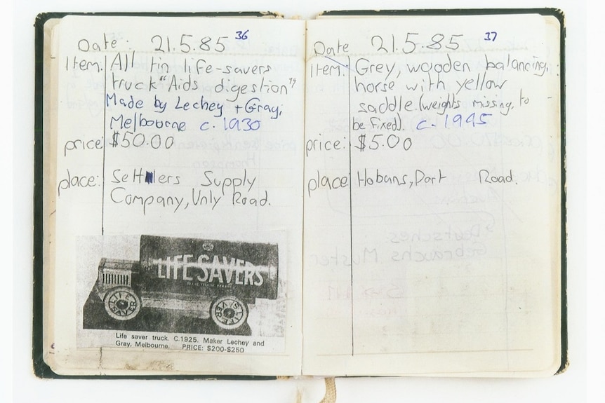 A scan of an open book shows children's handwriting listing a number of toys, their descriptions, prices and places of purchase.