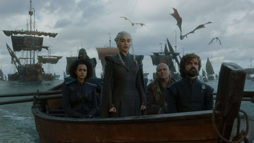 Peter Dinklage, Conleth Hill, Nathalie Emmanuel, and Emilia Clarke in Game of Thrones 