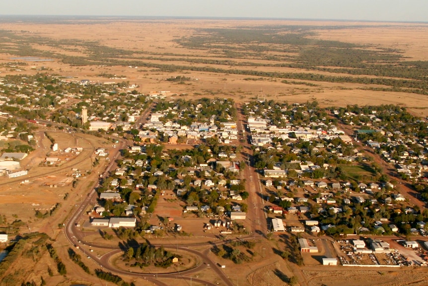 An aerial view of a red-dirt outback town