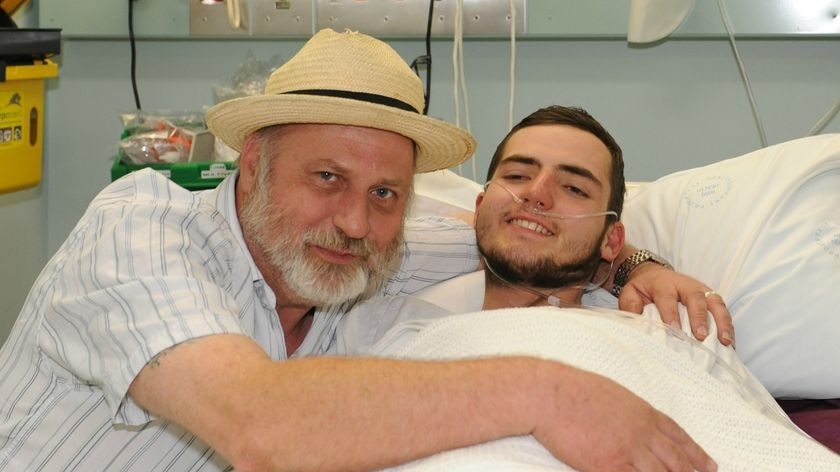 Reunited: Richard Cass with his son Jamie Neale at the Blue Mountains Hospital.