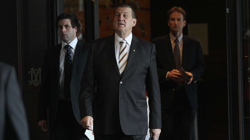 Jeff Kennett arrives for the funeral service of Hawthorn coach Allan Jeans in July 2011.