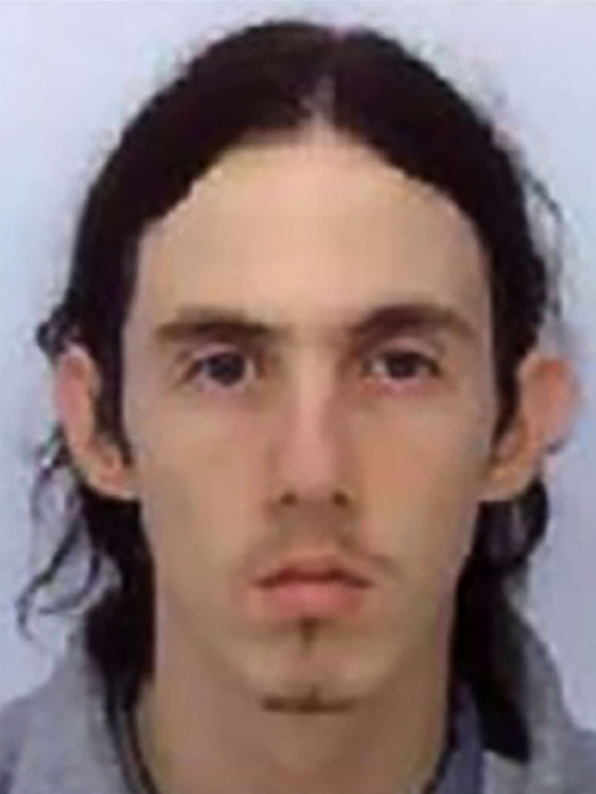 Custody picture of UK paedophile Richard Huckle.