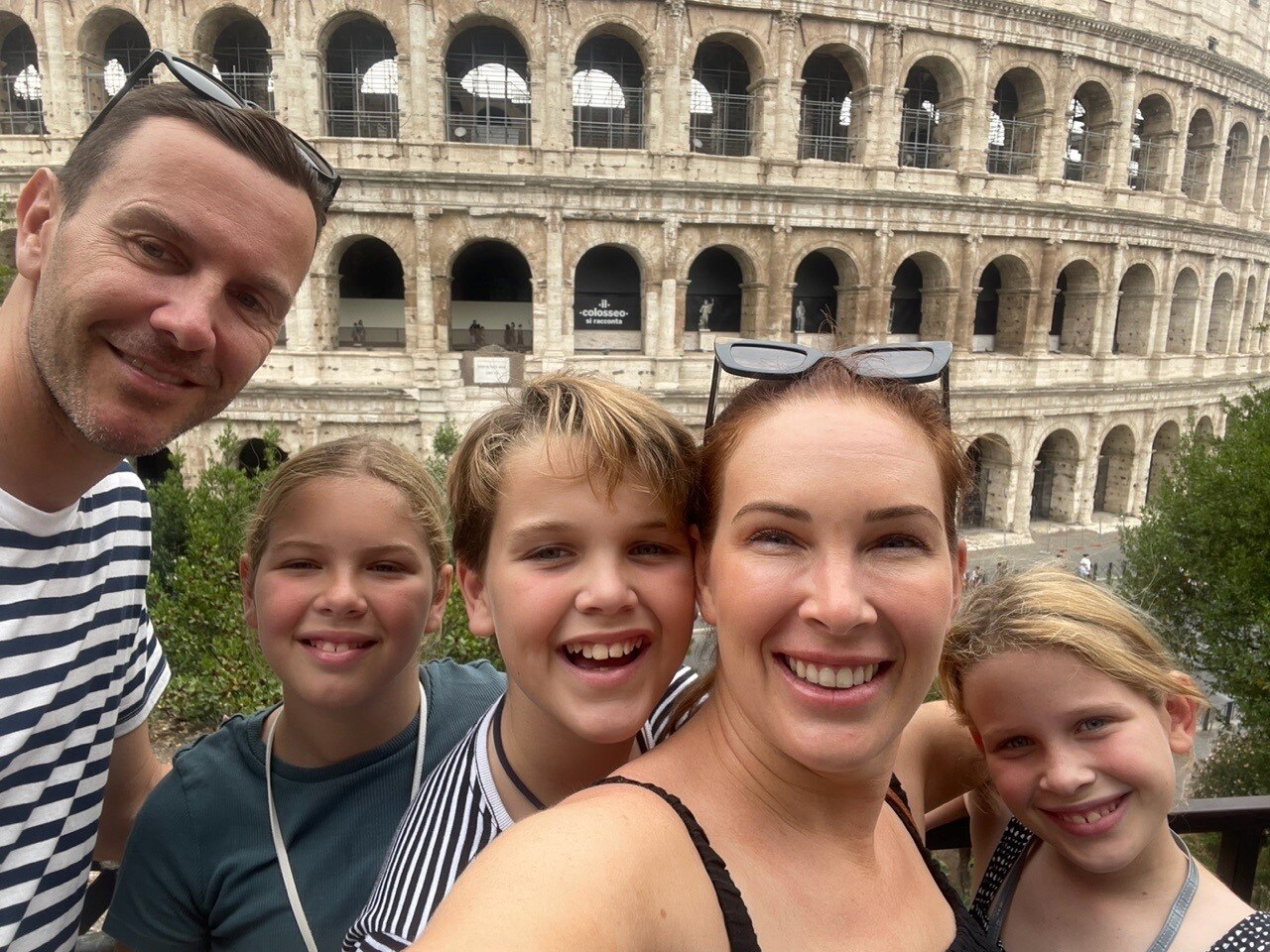 Sam Cardone (second from right) with her family at the Colosseum in Rome.