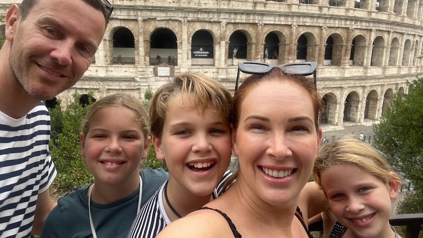 Sam Cardone (second from right) with her family at the Colosseum in Rome.