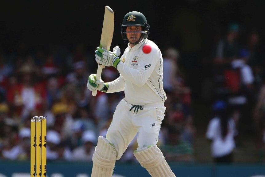 Usman Khawaja pulls away on day three at the Gabba