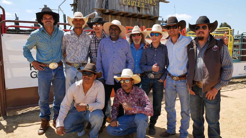 Cowboys lined up at the Harvey Dickson rodeo grounds.