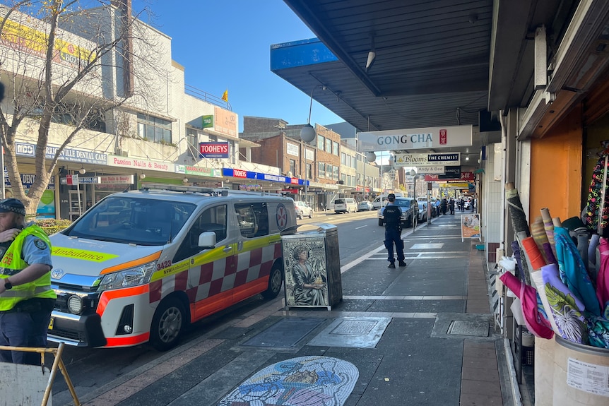 Police and ambulance outside a street in Sydney's inner west.