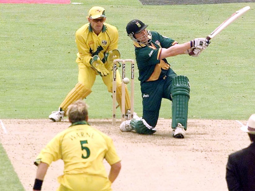 Daryll Cullinan is bowled attempting a slog sweep against Shane Warne