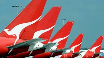 Qantas jets sit at Sydney International Airport in December, 2008. (AAP/Dean Lewins)
