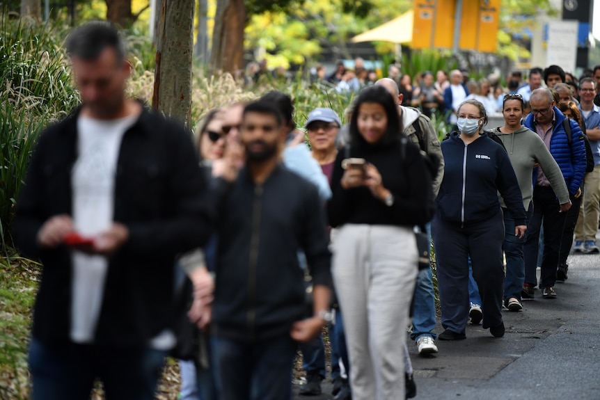 People waiting in line at Sydne's vaccination hub