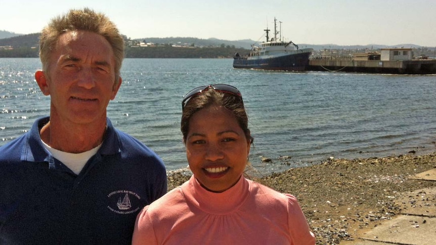 Malcolm McDougall and Anna Ledesma in front of the ship Corvina