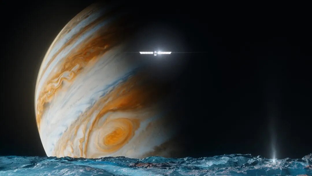 A probe hovering above an icy surface, with Jupiter in the background.