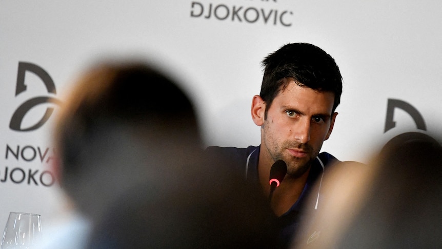 Novak Djokovic looks at the camera during a press conference in Serbia this 2017 file photo.