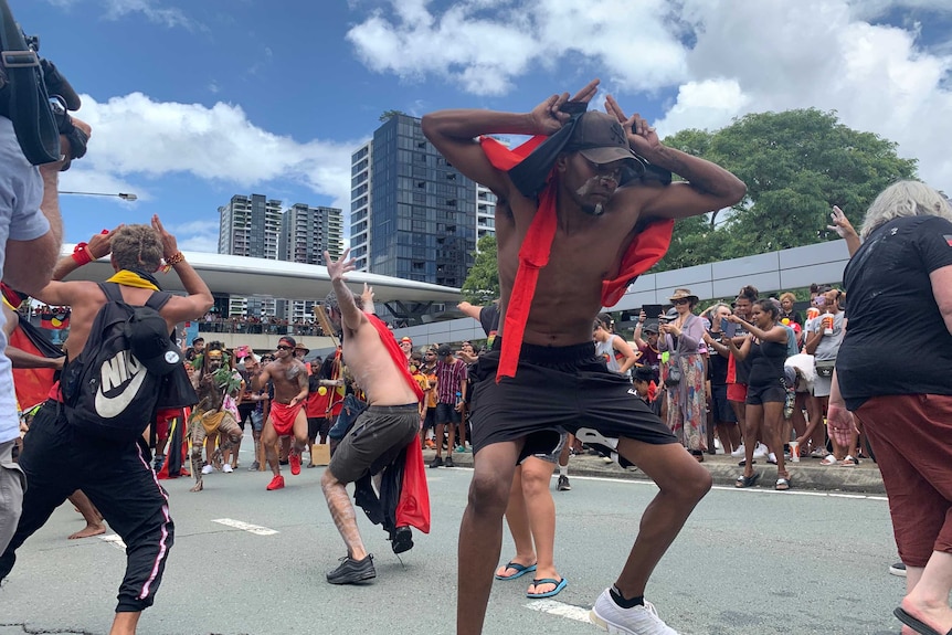 People dance during Invasion Day rally