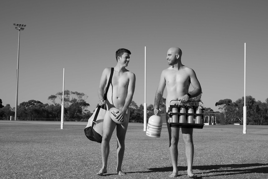 A photo of two players from the Bruce Rock Football Club.