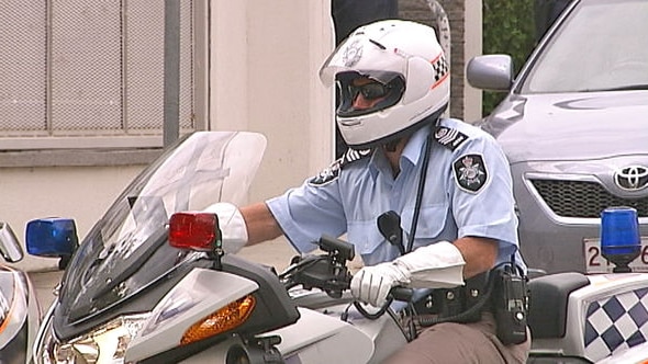 An ACT motorcycle police officer
